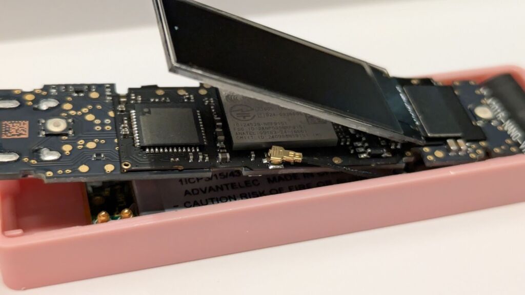 black PCB in pink casing