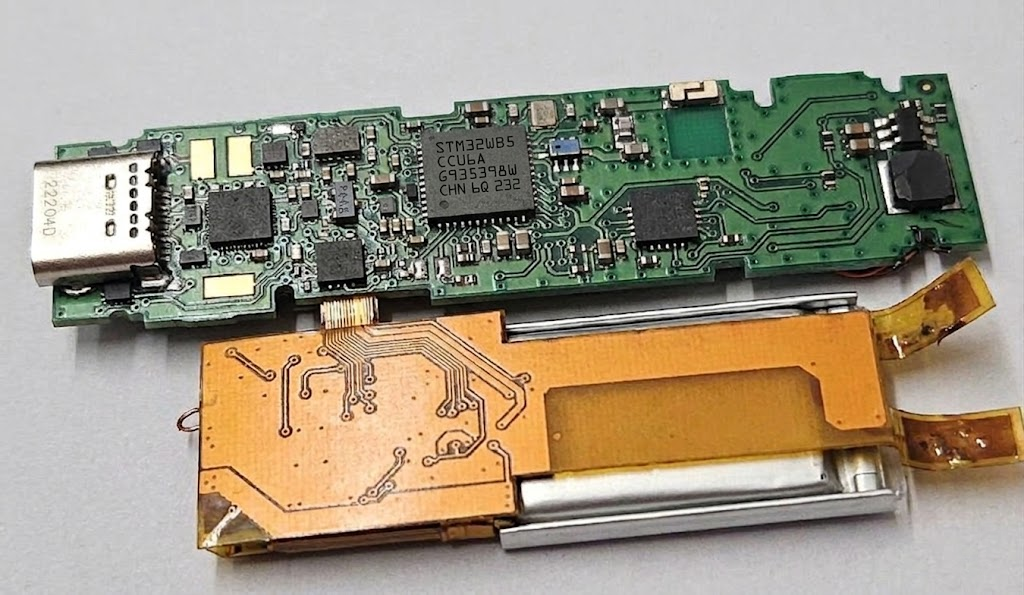 green Ledger signer PCB with orange casing