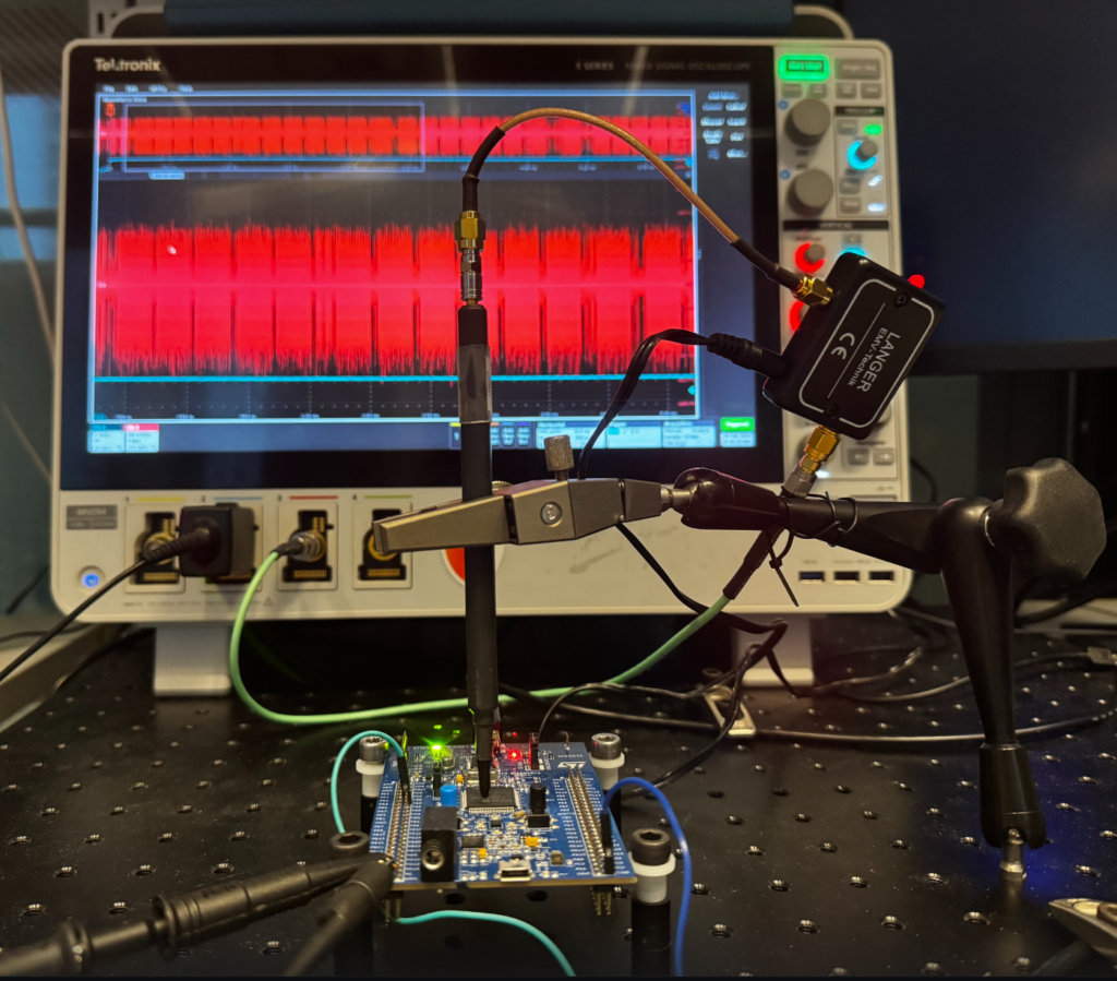 an oscilloscope and microcontroller in a ML-KEM Hardware Setup